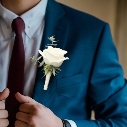Mystical Meadows: White and Green Themed Boutonniere - Image 6