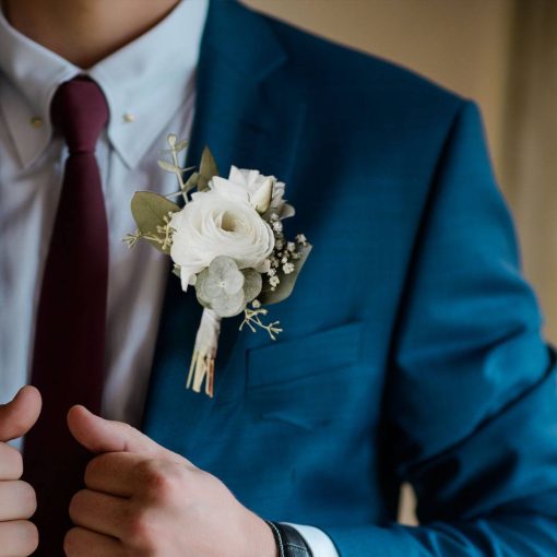 Mystical Meadows: White and Green Themed Boutonniere