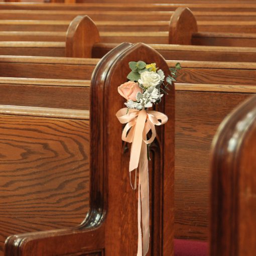 Whimsical Whispers: Blush and Ivory Themed Wedding Pew