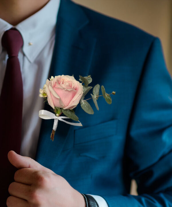 Whimsical Whispers: Blush and Ivory Bridal Themed Boutonniere